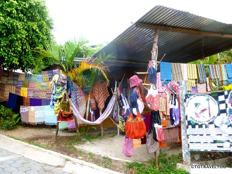 Craft shops line the street from the wharf along Lake Atitlan