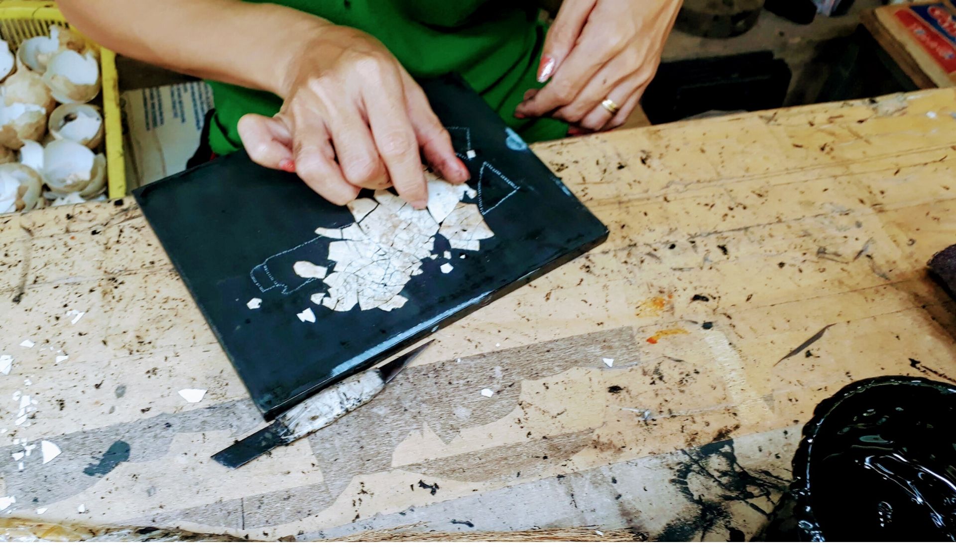 Placing the duck egg shells into the pattern