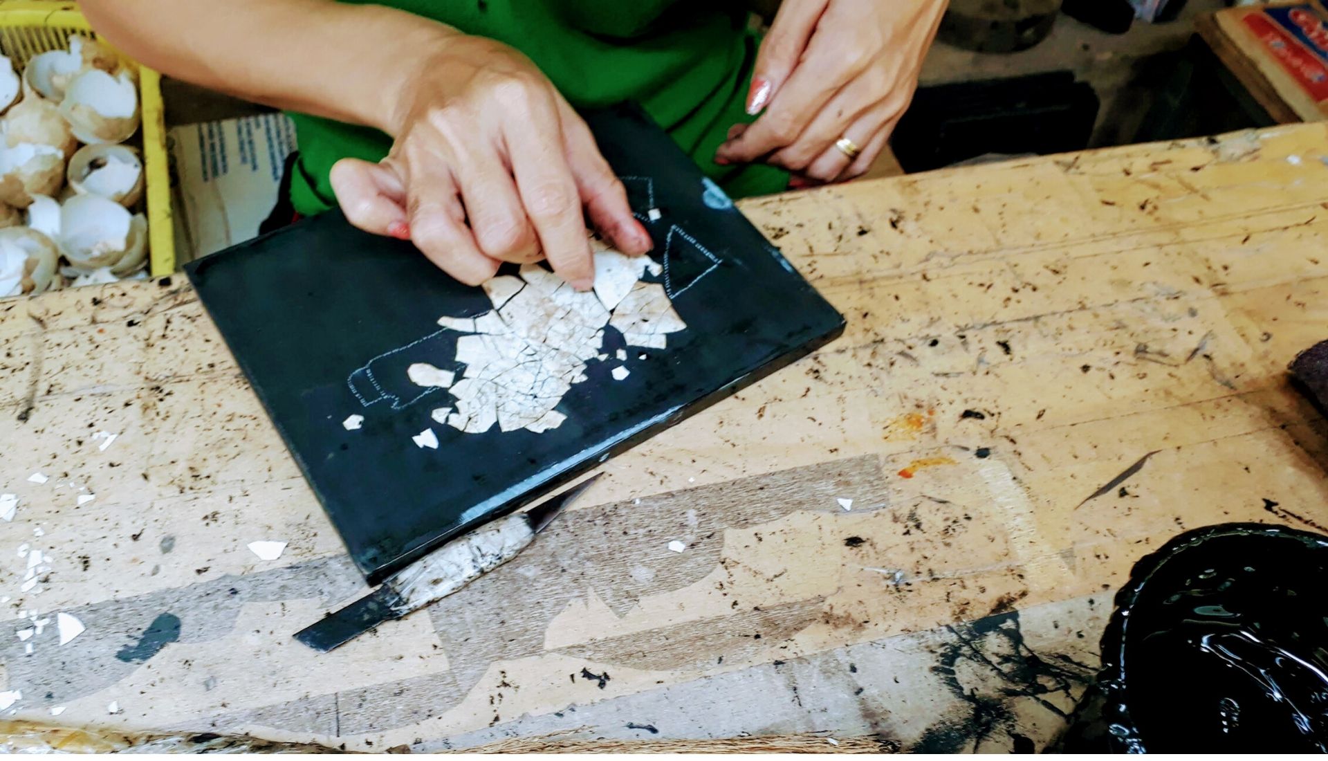 Placing the duck egg shells into the pattern 